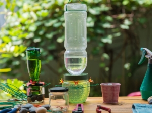 A close-up shot of a small composition of tools and equipment, being used to create a diy hummingbird feeder