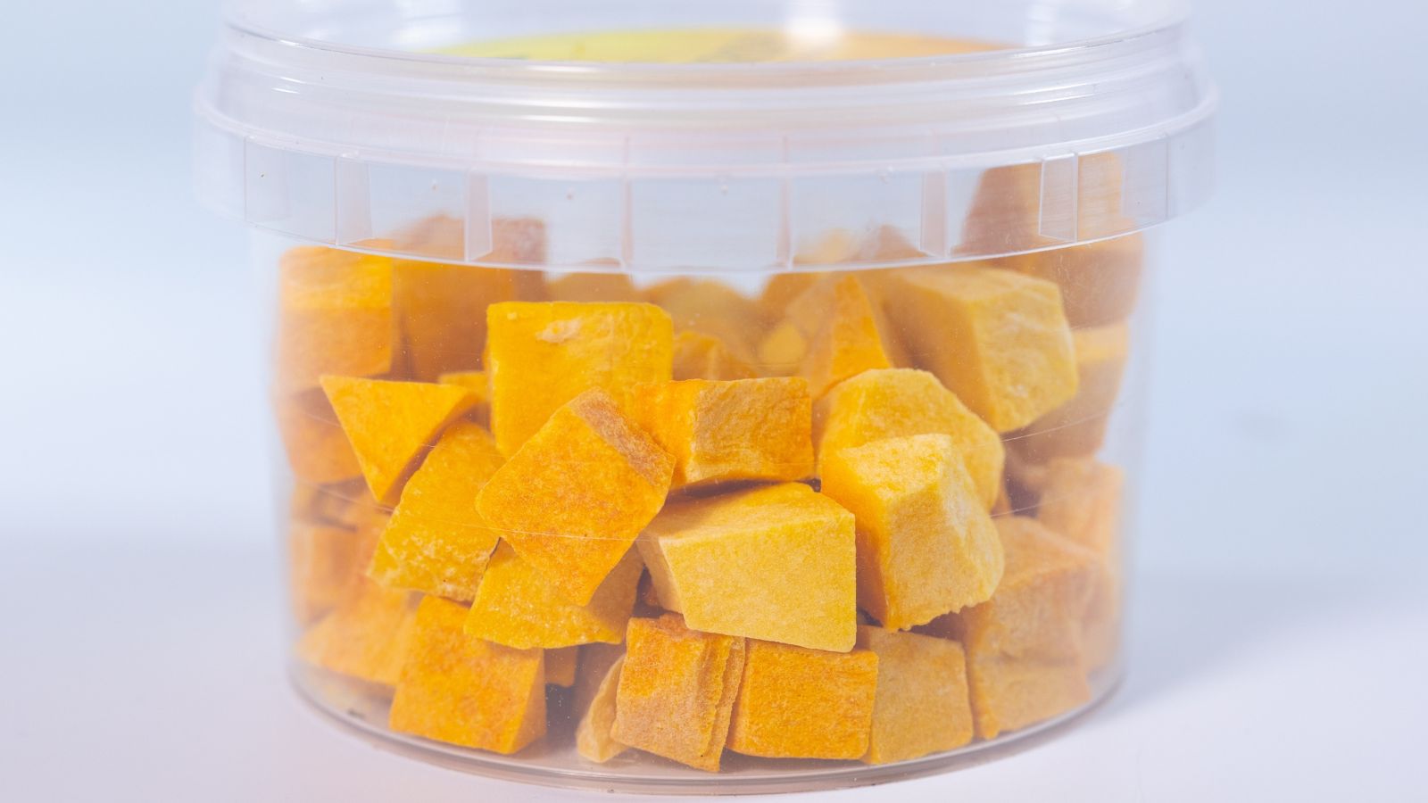 A container filled with freeze-dried crops in a well lit area