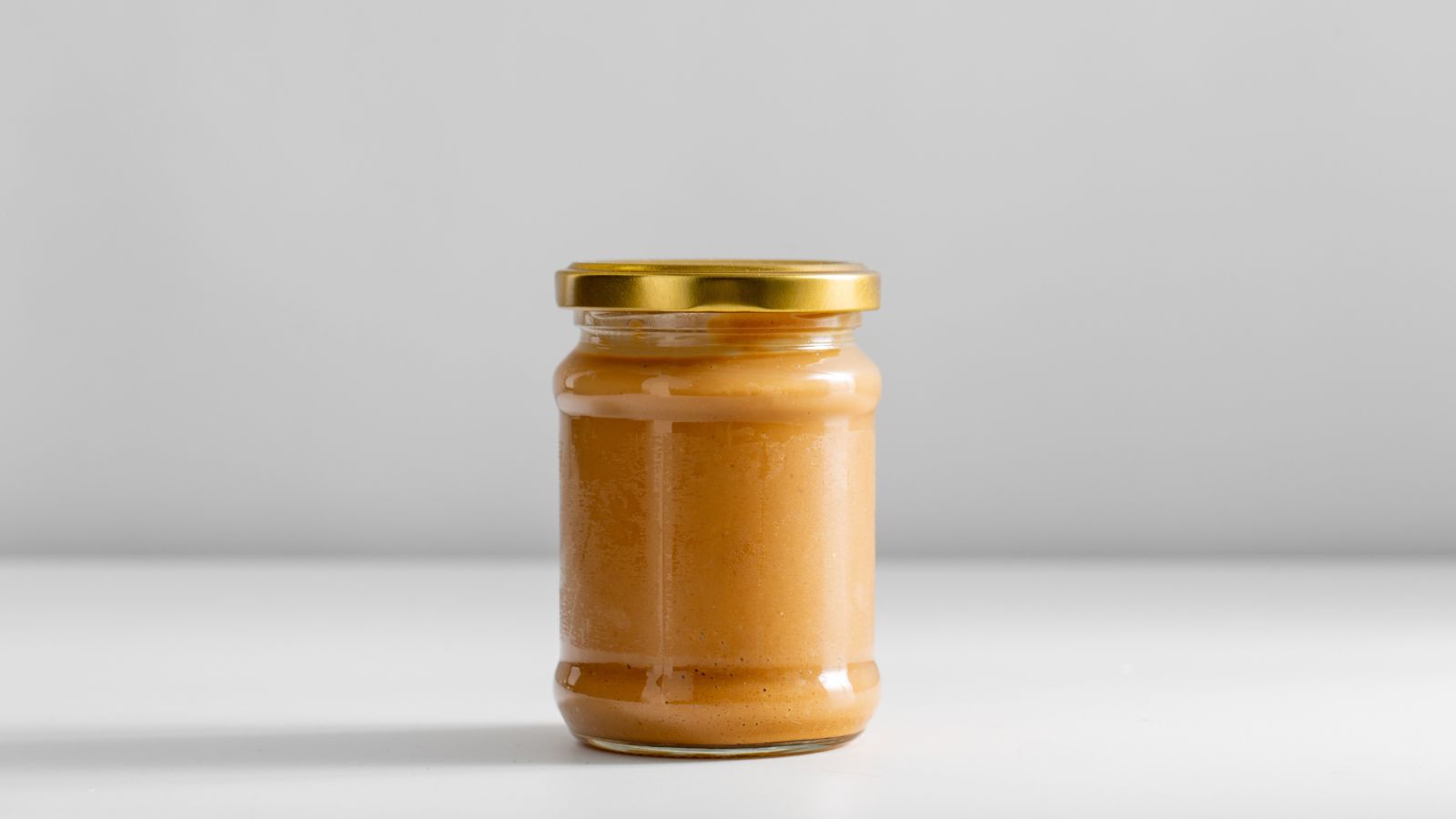 A shot of a jar of pureed crop in a well lit area