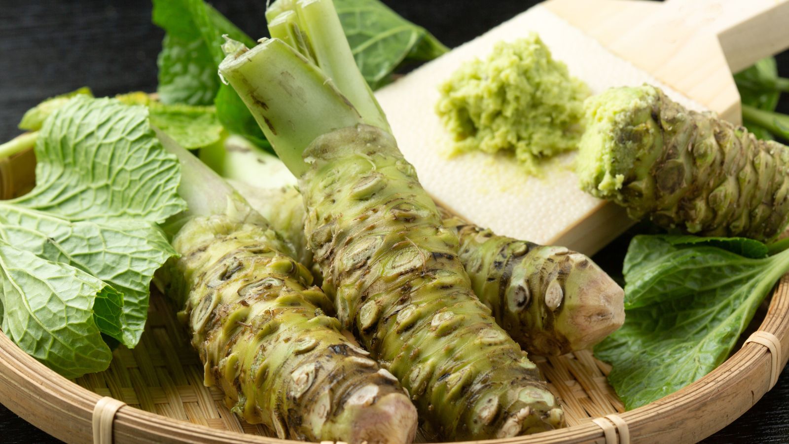 A shot of freshly harvested root crops on a wooden tray